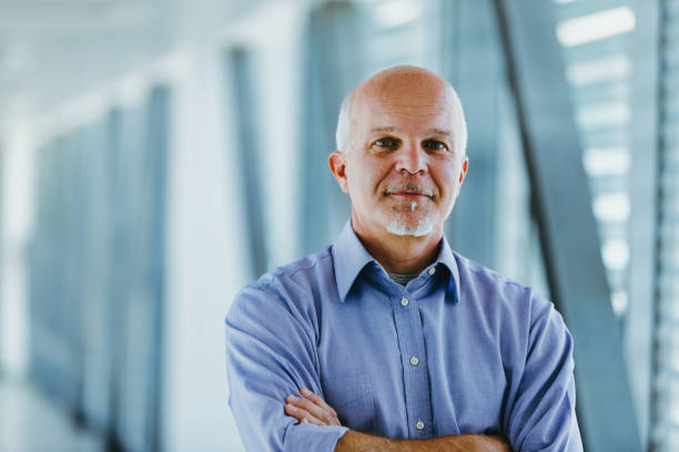 istock Mature businessman poses with serene confidence indoors 2152828066