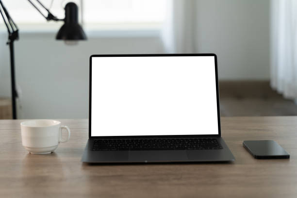 istock Laptop with blank screen on table. Workspace background new project on laptop computer with blank copy space screen for your advertising text message 2152831364