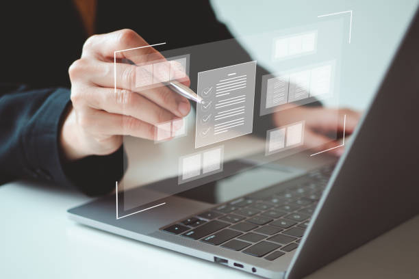 istock Document management and checklist concept, Businessman show e-document on email online management on virtual screen automation to efficiently document paperless operation technology 2152831419
