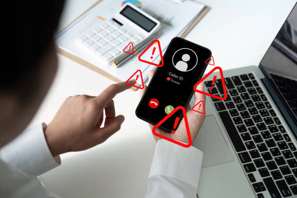 istock System hacked warning alert, Woman using smartphone with cyber attack network, virus, spyware, scam or Malicious software. Cyber security and cybercrime. Compromised information internet 2152831910