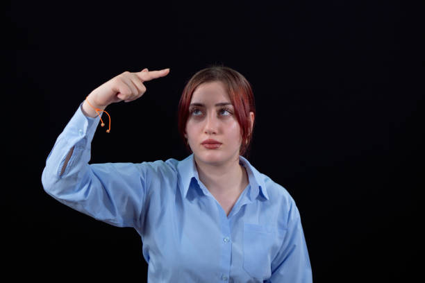 Young woman touching digital screen, Success is right at your fingertips.