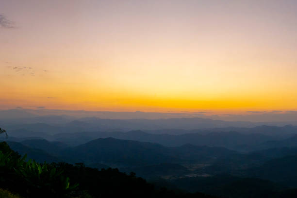 istock Scenic view dramatic beautiful sunset sky. Natural Sunset Sunrise on meadow silhouette shadow dark land. Vibrant dramatic sky on sunset, dawn, sunrise in Countryside. Landscape Colorful Sky At Sunset 2152833392