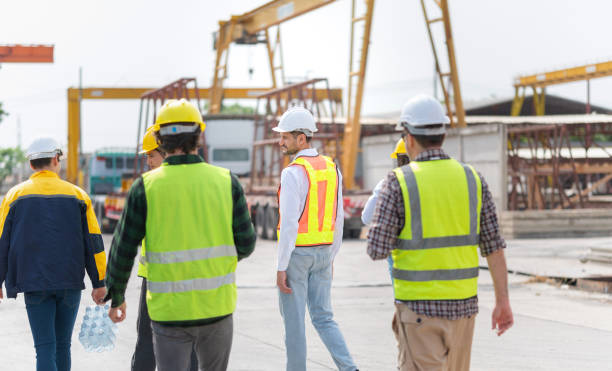 istock Group of Engineer and foreman worker team inspect the construction site, Site manager worker and builder on construction site 2152833639