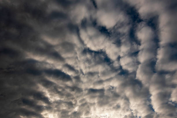 istock Dramatic dark storm rain clouds black sky background. Dark thunderstorm clouds rainny atmosphere. Meteorology danger windstorm disasters climate. Dark cloudscape storm disaster gloomy gray cloud sky 2152833753