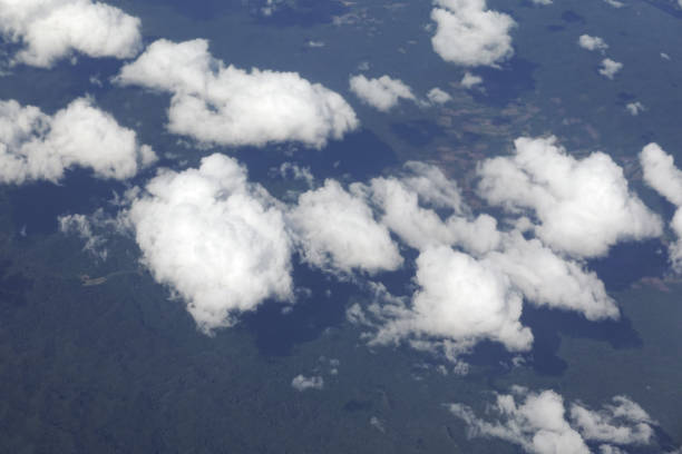 View from an airplane window to see the sky and white cloud