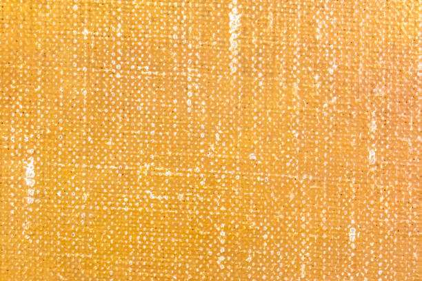 hand painted artistic canvas in vibrant orange color.