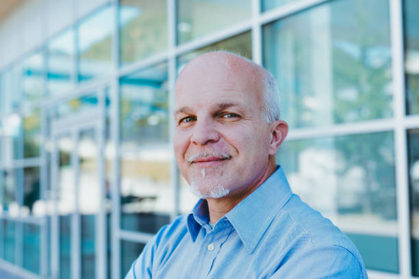 istock Middle-aged professional enjoys sunny, modern environment 2152837431