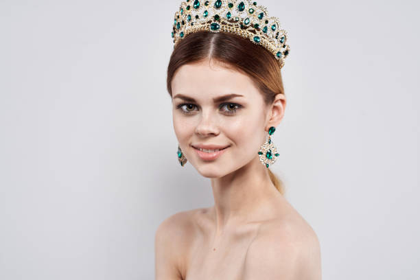 istock beautiful woman with a crown on her head makeup model 2152838497