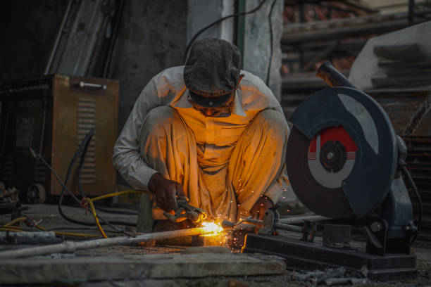 istock Skilled Welder welding metal in Workshop 2152838534