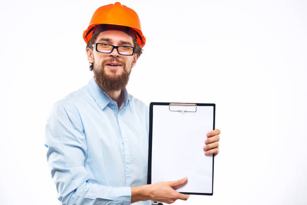 istock Business man in orange paint security documents providing services 2152840649