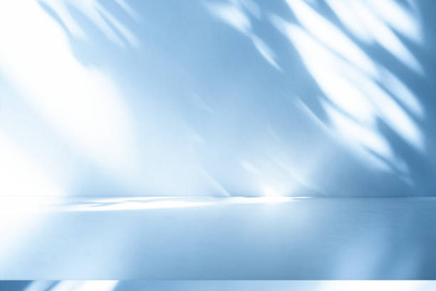 istock Wall interior background, studio, and backdrops show products. with shadow from window color white and blue light. background for text insertion and presentation of product 2152842161
