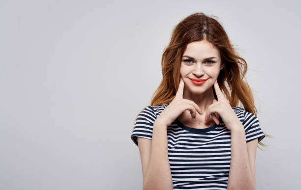 istock emotional woman with bright makeup gesturing with hands on gray background Copy Space 2152842746