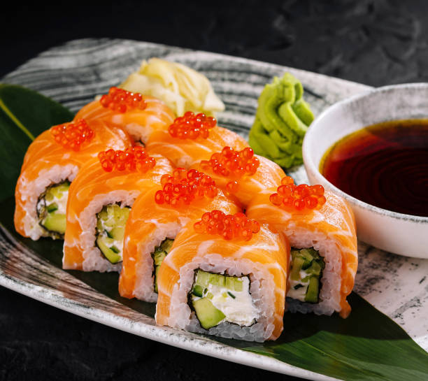 istock Exquisite sushi roll platter with salmon roe 2152843482