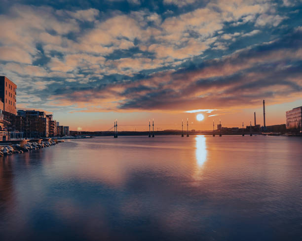 istock Sunset over a bridge on a lake on a winter day in Jonkoping, Sweden 2152845233