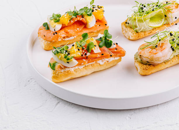 istock Gourmet bruschetta platter on white background 2152845828
