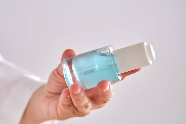 istock Blue serum with pipette in a womans hands in a robe. 2152845967