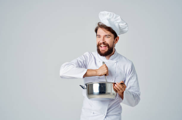 istock chef cook food in a saucepan in the kitchen cooking work 2152846532