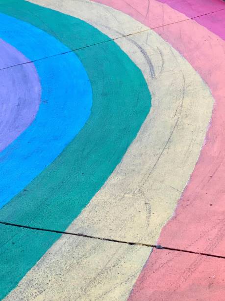 istock a photography of a colorful painted sidewalk with a fire hydrant. 2152846853