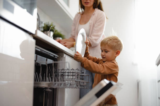 istock Mother and Son Doing the Dishes 2152850042