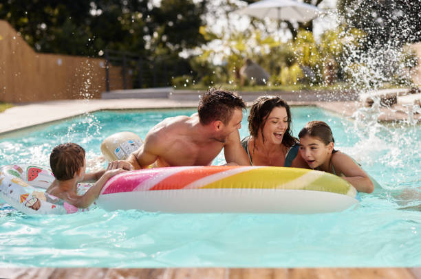 istock Family's fun in the pool! 2152850399