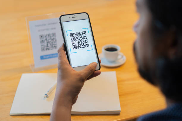 istock Man scanning tag in Coffee shop accepted generate digital pay without money 2152852550