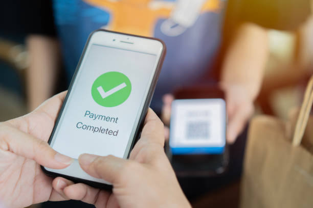 istock Customer using phone for payment at cafe restaurant, cashless QR code technology and money transfer concept. 2152852552