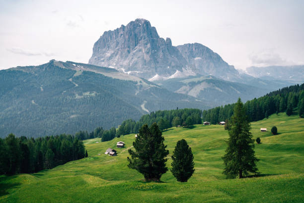 Gardena pass in Italian Alps at dramatic cloudy weather.