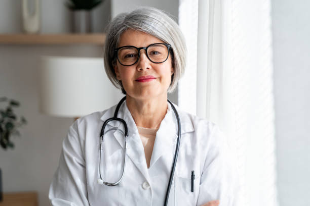 istock Confident senior female doctor with stethoscope 2152853739
