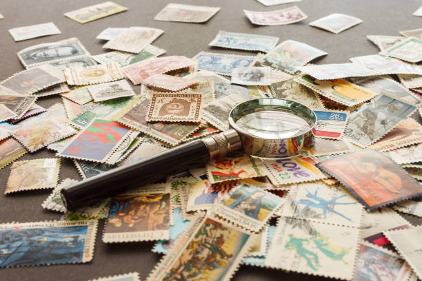 istock Postage stamps and magnifying glass. 2152854173