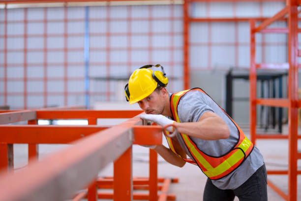 istock Blue collar worker is working at metal sheet warehouse. 2152856416