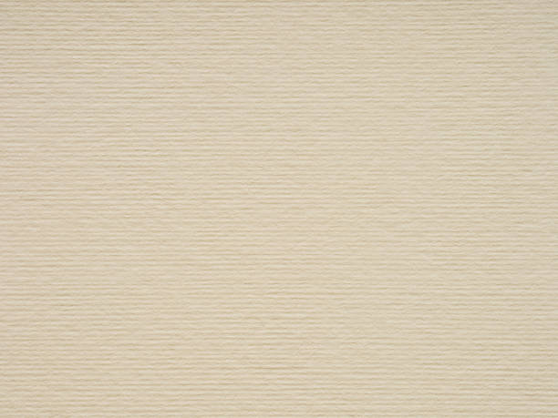 Striped beige paper, background. Designer cardboard.