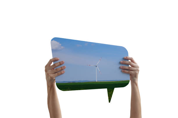 Hand holding speech bubble with Wind Turbines