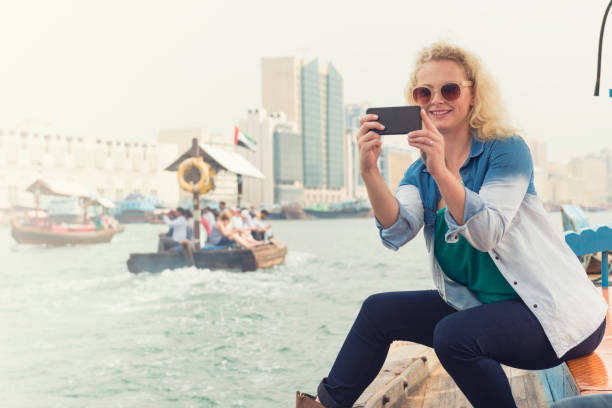 istock Tourist woman visiting historic Dubai 2152865470
