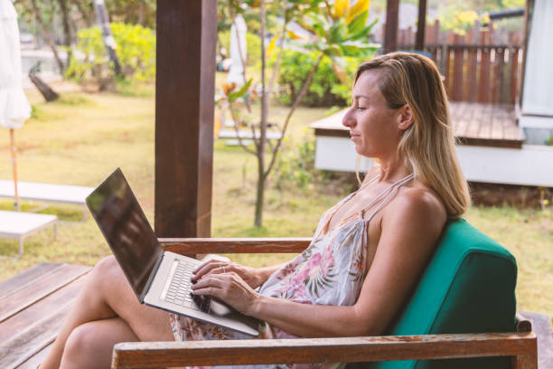 istock Woman Working on Laptop Outdoors 2152867065