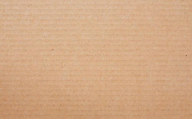 istock Cardboard sheet texture background, detail of recycle brown paper box pattern. 2152874500