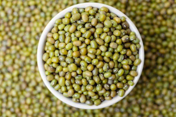 istock Uncooked, green mung beans in bowl 2152874713