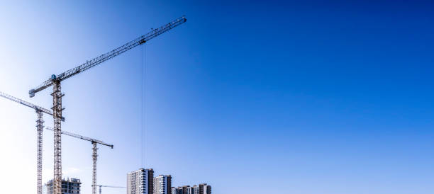 istock Construction industry building. Construction industry site with cranes, fittings and concrete. 2152875159