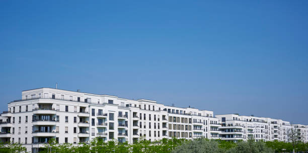 istock Large group of white apartment houses 2152877963