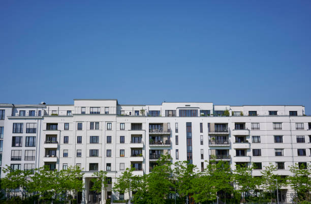 istock Row of modern white town houses 2152878027