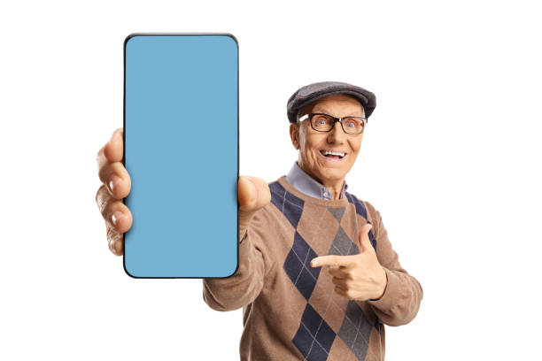 istock Senior man showing a smartphone with blue screen in front of camera 2152879465