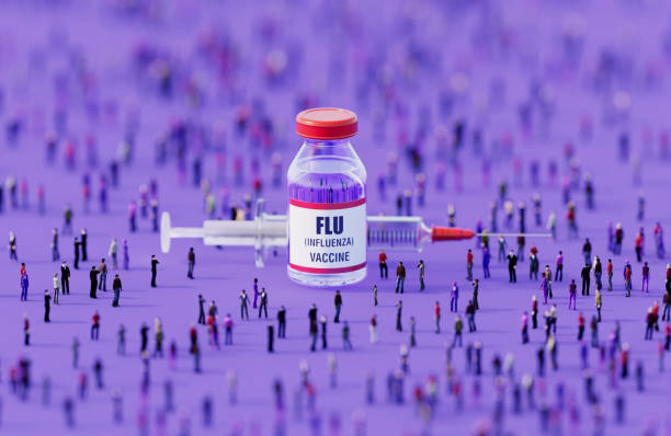 istock Human Crowd Surrounding An Injectable Flu Vaccine Bottle On Purple Background 2152880375