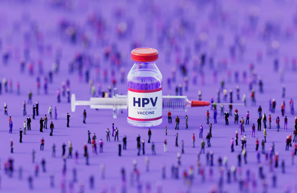 istock Human Crowd Surrounding An Injectable HPV Vaccine Bottle On Purple Background 2152880446
