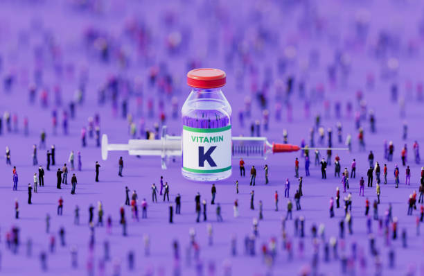 istock Human Crowd Surrounding An Injectable Vitamin K Bottle On Purple Background 2152881297