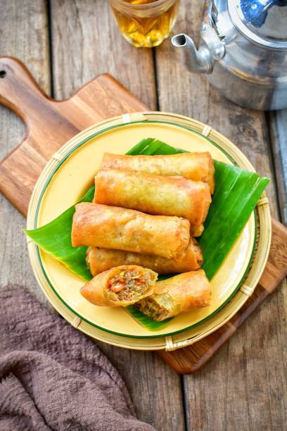 Deep fried spring rolls , Thai called popia, top view food table