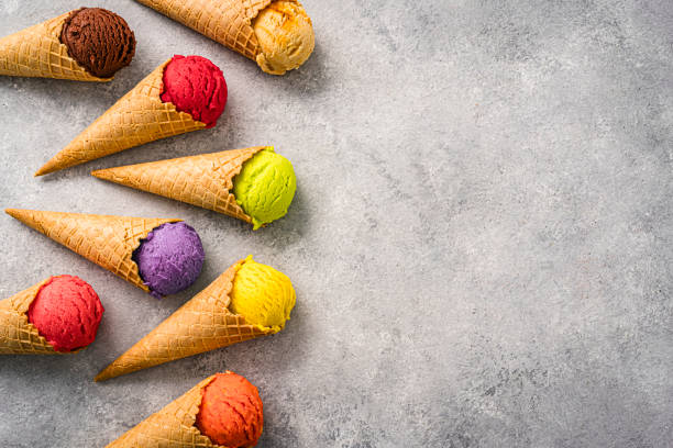 istock Multicolored ice cream cones shot from above on gray background. Copy space 2152882516