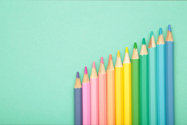 istock Pastel color pencils on mint background. Space for text 2152882808