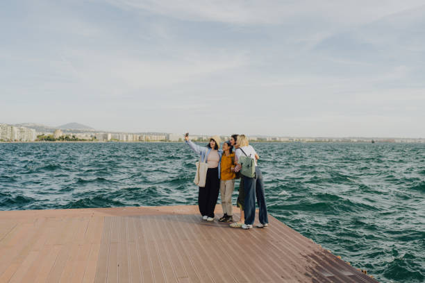 istock Group of female friends taking a selfie while on a city break 2152884190