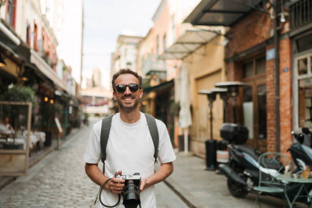 istock Male photographer exploring the new city while on a vacation 2152885157
