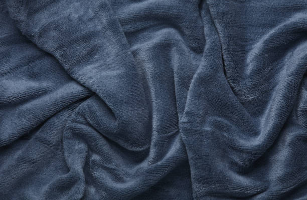 Dark blue fleece texture. Fabric background
