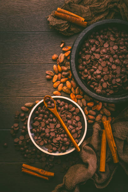 istock Bittersweet dark chocolate drops with cocoa beans, sugar-free couverture, baking and cooking ingredient 2152889093